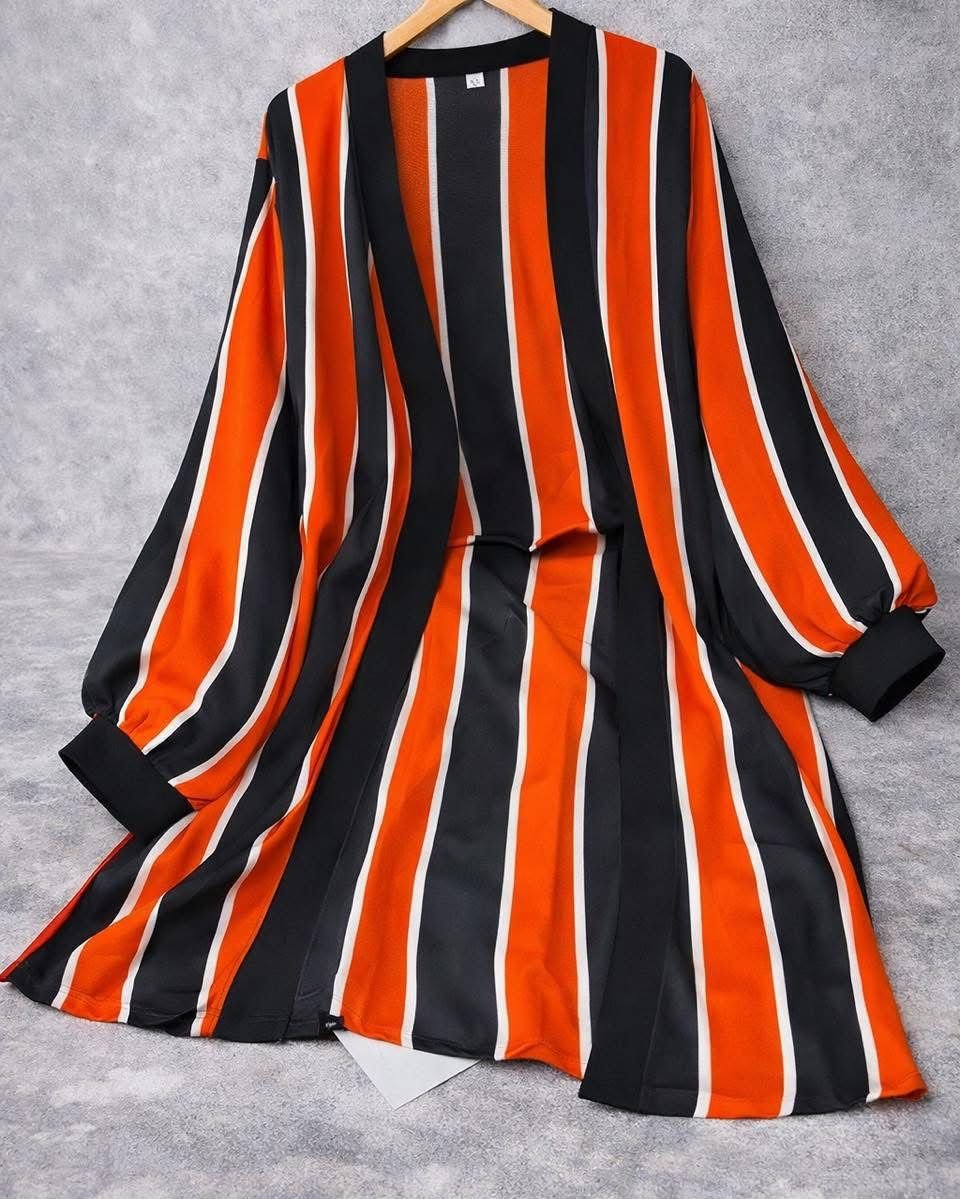 Printed shrug with orange stripes